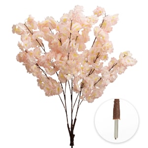 May include: Artificial cherry blossom branch with light pink and yellow flowers. The branches are dark brown, and the stem has a textured, brown appearance. The flowers are clustered together, creating a full, lush look. Ideal for floral arrangements.