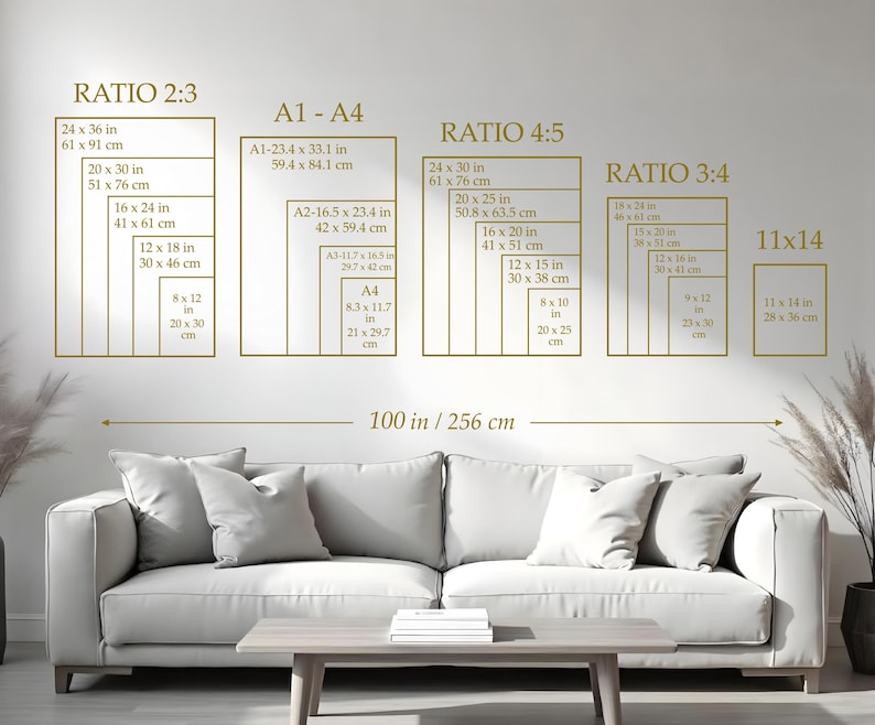 May include: A wall display featuring various rectangular frames with size ratios and dimensions in inches and centimeters. The text includes "RATIO 2:3", "A1-A4", "RATIO 4:5", "RATIO 3:4", and "11x14". A sofa and coffee table are in the foreground.
