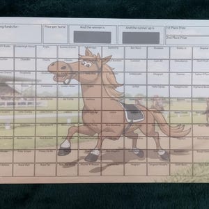 May include: A printed game board with a cartoon horse illustration. The board is divided into squares with text, likely for a fundraising event. The text includes phrases like "Raising funds for" and "Price per horse."