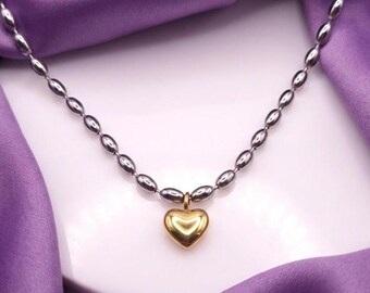 Gouden harthanger aan zilveren kralenketting, sierlijk ontwerp, minimalistische stijl, damesaccessoires, dagelijks gebruik, cadeau voor haar, nu populair