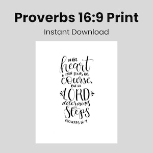 May include: A white print with black calligraphy text. The text reads "Proverbs 16:9 Print" at the top, followed by "Instant Download". The main text is a quote from Proverbs 16:9. The background is a light gray.