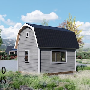 May include: A grey barn-style building with a black roof and white trim. The building has two windows and a small door. The text "BAMBOO DESIGNS" is in the lower left corner. The building is surrounded by grass and trees.