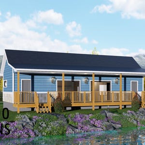 Op de afbeelding: Een blauw huis met witte randen en een donker dak, voorzien van een brede houten veranda met leuningen en trappen. Het bouwwerk staat bij een rotsachtige oever met paarse bloemen, en de tekst BAMBOO DESIGNS is linksonder in beeld zichtbaar.