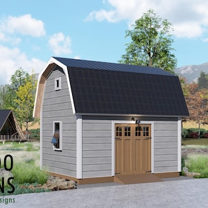 May include: A grey barn-style shed with a black roof and wooden doors. The shed has a small window and a light fixture above the doors. The image also shows a smaller A-frame structure and the text "BAMBOO DESIGNS Home Plans & Designs".