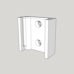 Może przedstawiać: Biały, geometryczny wspornik z dwoma okrągłymi otworami i zagłębionym kanałem. Wspornik ma prostokątny kształt z schodkowym wzorem, odpowiedni do montażu lub podparcia.