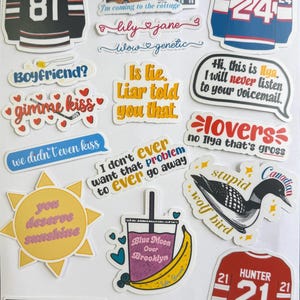 May include: A collection of colorful stickers with various designs and text. Includes hockey jerseys with names and numbers, phrases like "Boyfriend?" and "gimme kiss," and a drawing of a cocktail and banana. Other stickers say "Blue Moon Over Brooklyn" and "you deserve sunshine."