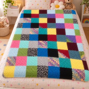 May include: A rectangular crochet blanket featuring a grid of multicolored squares in shades of yellow, pink, blue, green, black, and variegated yarn. The blanket is constructed from individual textured squares joined together in a uniform pattern.