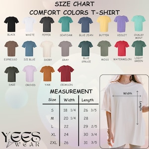 May include: A size chart for Comfort Colors T-shirts, showcasing various colors like black, white, and blue jean. The chart includes measurements for sizes S to 2XL, with width ranging from 18 1/4 to 26 inches and length from 26 3/5 to 31 3/5 inches. The brand logo "YEES WEAR" is at the bottom.