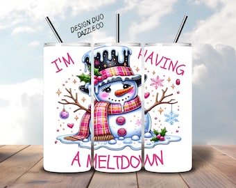 May include: White tumbler with a whimsical snowman design. The snowman wears a black top hat, pink scarf, and has a carrot nose. Text reads "I'm Having A Meltdown". Includes a black straw. A fun, festive item for winter.