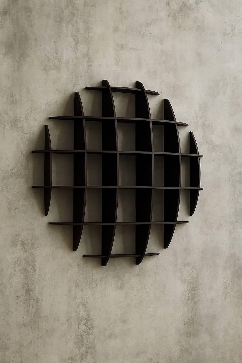 May include: A dark brown, circular wall shelf with a grid-like design. The shelf is made of vertical and horizontal wooden slats, creating multiple storage compartments. The shelf is mounted on a light gray textured wall.