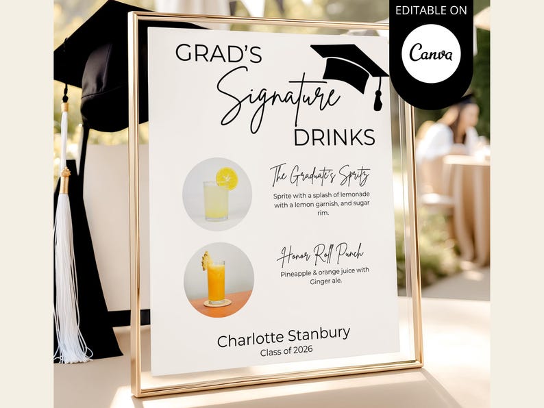 May include: A vertical rectangular sign in a gold frame titled Grad's Signature Drinks with a black graduation cap icon. It lists The Graduate's Spritz and Honor Roll Punch with drink images and descriptions, plus the name Charlotte Stanbury Class of 2026.