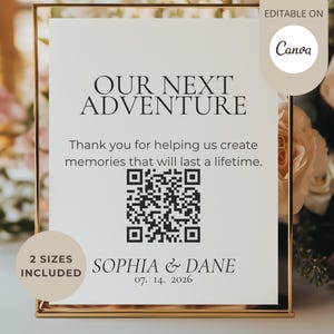 May include: A white rectangular wedding sign in a gold frame featuring the black text "OUR NEXT ADVENTURE", "Thank you for helping us create memories that will last a lifetime.", "SOPHIA & DANE", "07. 14. 2026", and a central QR code.