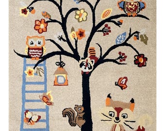 May include: A colourful rug depicting a black tree adorned with flowers, owls, and a fox. A blue ladder, birdhouse, and squirrel are also featured. The rug has a beige background and is decorated with butterflies and mushrooms.