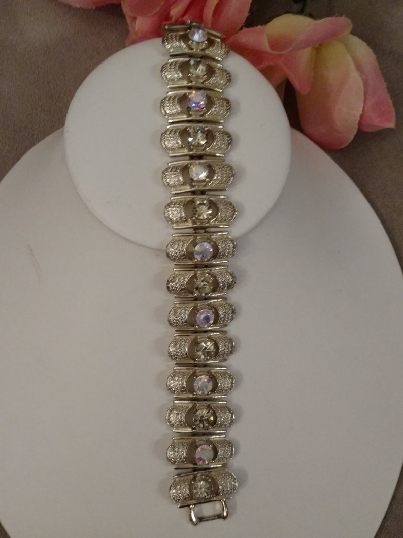 Stamped Light Gold Tone CORO Designer Bracelet Strappy Style Rhinestone Bracelet Aurora Borealis Pale Yellow and AB Stones