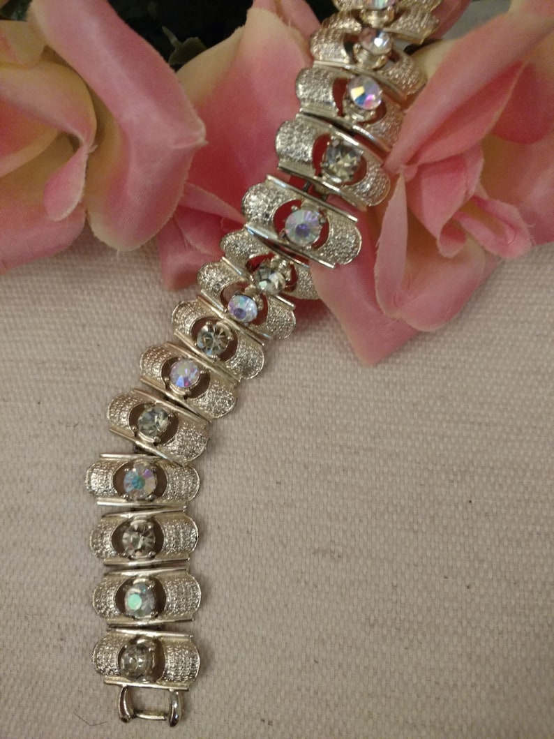 Stamped Light Gold Tone CORO Designer Bracelet Strappy Style Rhinestone Bracelet Aurora Borealis Pale Yellow and AB Stones
