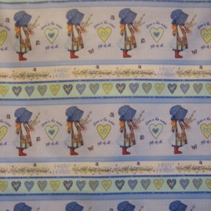 Holly Hobbie  2014 Those Characters from Cleveland , Inc Under license by SPX Fabrics ( 18 x 44 inches )