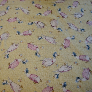 Beatrix Potter Jemima Puddleduck on yellow fabric with her eggs,  Quilting Treasures ( 18 x 44 inches )  2010