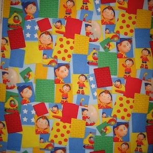 Noddy in Toyland Quilting Treasures  ( 18 x 44 inches ) 2010 - collage of Noddy  in car and helicopter