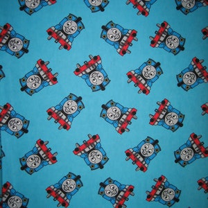 Thomas the Tank Engine on turquoise blue FLANNEL fabric  ( 36 x 42 inches )