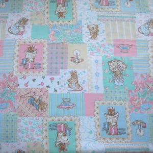 May include: A patterned fabric with a patchwork design. The fabric features charming illustrations of mice engaged in various activities, set against a backdrop of pastel pink, blue, and green squares with floral and striped patterns.