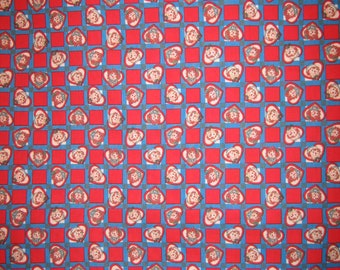 Raggedy Ann and Andy checkerboard faces,   Daisy Kingdom  # 4512 , thick cotton fabric