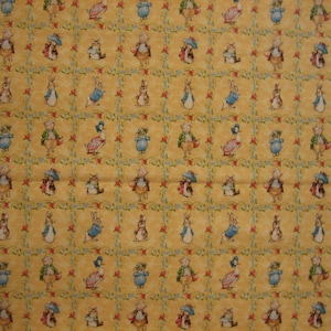 Beatrix Potter characters on yellow by Quilting Treasures ( 2007 ) by the half yard 18 x 44 inches