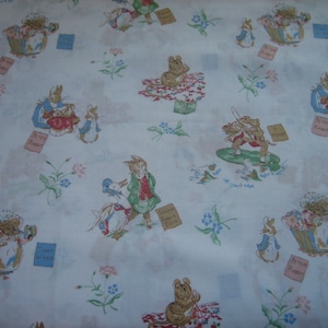 Beatrix Potter characters on white Spring Industries, slight sheen ( 18 x 44  inches ), 1986