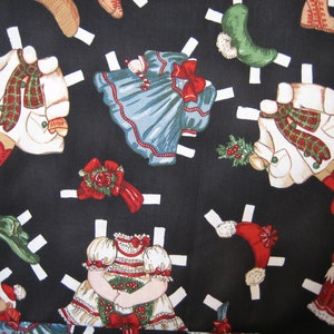 Windham Fabrics Paper Doll Christmas clothes pattern No 30861 black background ( 18 x 44 inches )