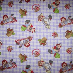 Raggedy Ann and Andy picnic purple fabric ( 18 x 44 inches ) Simon & Schuster