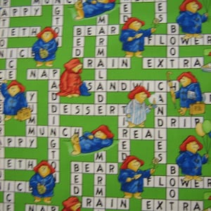 Paddington Bear Green crossword puzzle fabric by Quilting Treasures 2008 ( 18 x 44 inches )