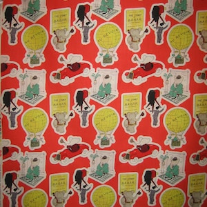 May include: Red fabric with a repeating pattern of Babar the Elephant illustrations. The design includes Babar in a car, a hot air balloon, and holding a book titled "The Story of Babar".