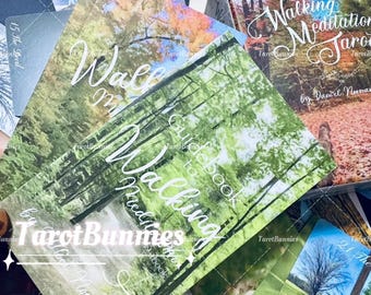 May include: A collection of tarot guidebooks titled "Walking Meditation Tarot" by Dandel Norman. The covers feature nature scenes with trees and foliage in shades of green, orange, and blue. The text "Tarot Bunnies" is also visible.