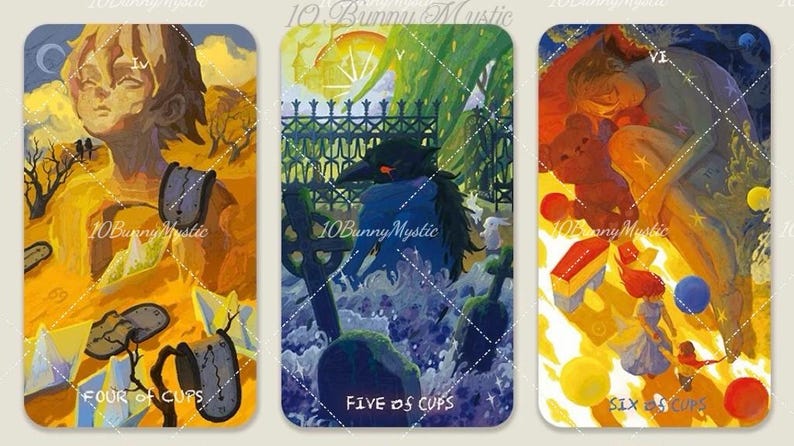 May include: Three tarot cards with illustrations. The first card shows a figure with the text "FOUR of CUPS". The second card depicts a crow with the text "FIVE of CUPS". The third card shows a figure with the text "SIX of CUPS". The artist's name "10BunnyMystic" is on each card.