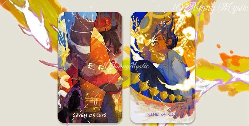 May include: Two tarot cards with colorful illustrations. The left card reads "SEVEN OF CUPS" and depicts a figure with a crown. The right card reads "NINE OF CUPS" and shows a person with a cup. The artist's name, "10BunnyMystic", is visible.