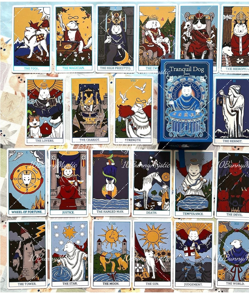 May include: A collection of tarot cards featuring dog illustrations, including The Fool, The Magician, The High Priestess, The Empress, The Hierophant, The Lovers, The Chariot, Strength, The Hermit, Wheel of Fortune, Justice, The Hanged Man, Death, Temperance, The Devil, The Tower, The Star, The Moon, The Sun, Judgement, and The World, alongside a blue box labelled The Tranquil Dog.