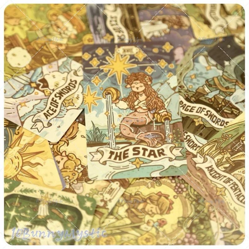 May include: A collection of tarot cards with whimsical illustrations. The central card features a mermaid-like figure labeled "The Star." Other cards include "Ace of Swords," "Page of Swords," and "Knight of Pentacles." The color palette is soft, with shades of beige, blue, and green.