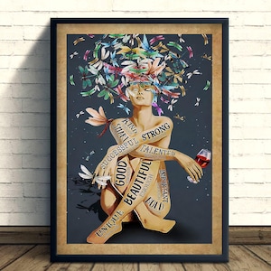 May include: Framed art print depicting a seated figure with a head of colourful butterflies and dragonflies. Text on the figure reads "Kind, Smart, Successful, Good, Beautiful, Unique, Strong, Talented, Important, Bold, Enough." The figure holds a glass of red wine.