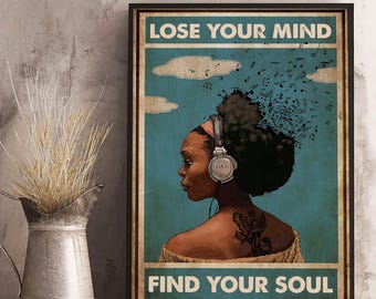 May include: Framed poster with the text "LOSE YOUR MIND FIND YOUR SOUL". The poster features a woman wearing headphones, with musical notes emanating from her hair. The background is teal with white clouds.