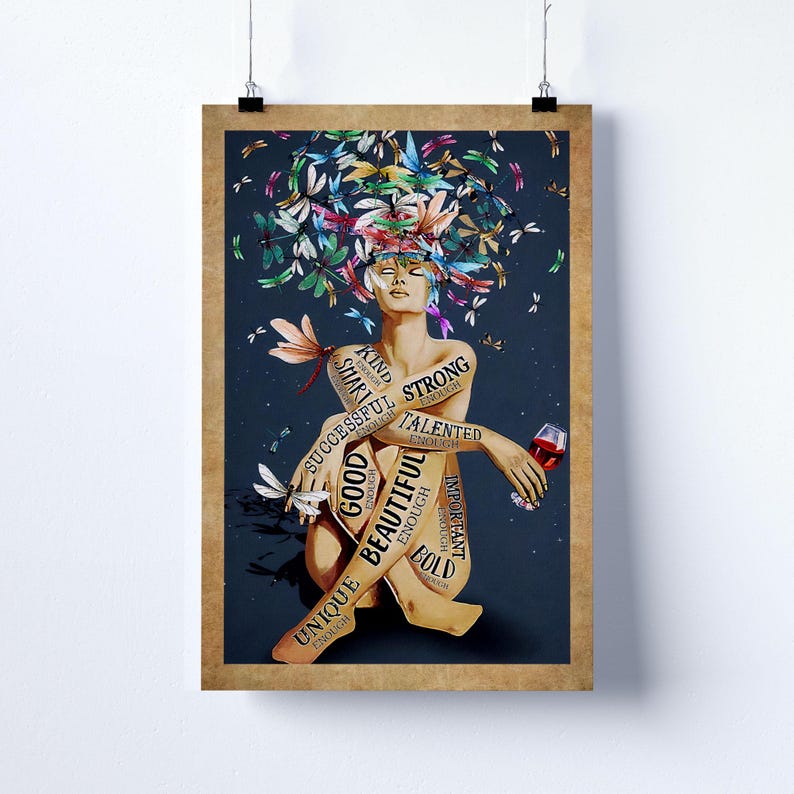 May include: A poster showing a seated figure with a crown of dragonflies in various colours. The figure's body is inscribed with words such as "Strong," "Beautiful," and "Unique." The figure holds a glass of red wine, against a dark blue backdrop.