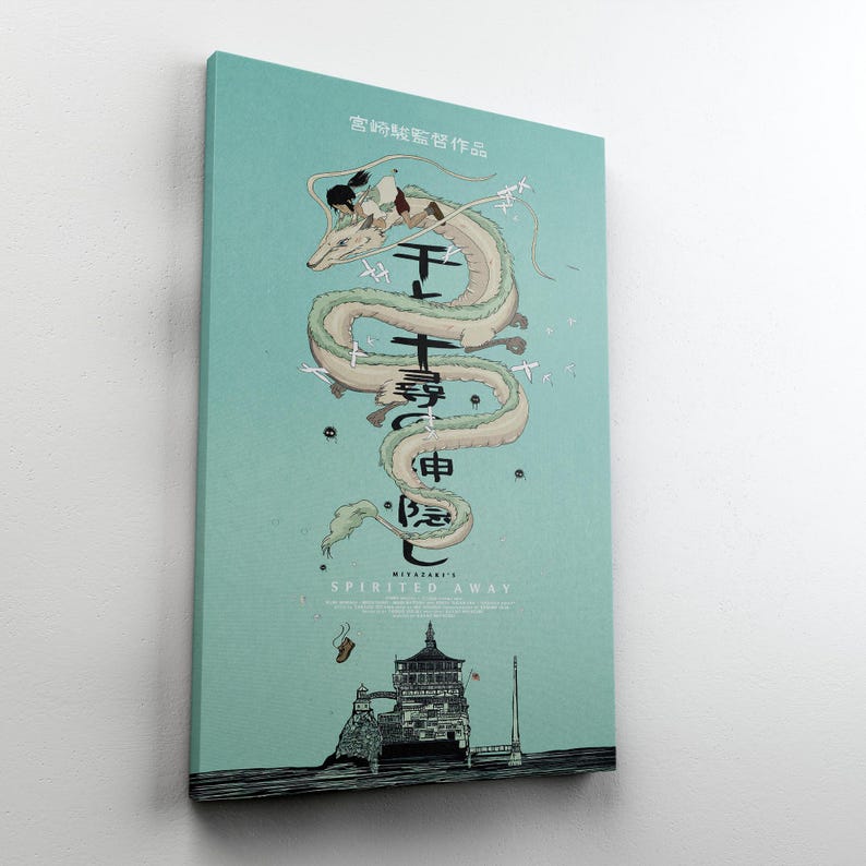 May include: A canvas print of the animated film "Spirited Away." The artwork features a long, serpentine dragon with a girl riding on its back, set against a light blue background. Japanese text and a detailed illustration of a building are also visible.