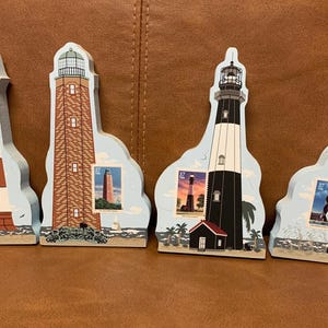 Cat’s Meow Lighthouse with Lighthouse Stamp collection. Set of 4 plus Clipper Ship collectible