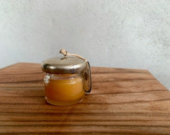 Natural solid perfume in glas jar with silver artisan lid