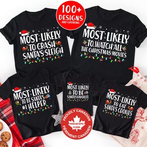 May include: Five black short-sleeved shirts featuring white text and Christmas-themed graphics. Each shirt displays a unique 'Most Likely To' phrase, including 'Crash Santa's Sleigh', 'Watch All The Christmas Movies', 'Be Santa's #1 Helper', 'Be Santa's Favorite', and 'Eat Santa's Cookies'.