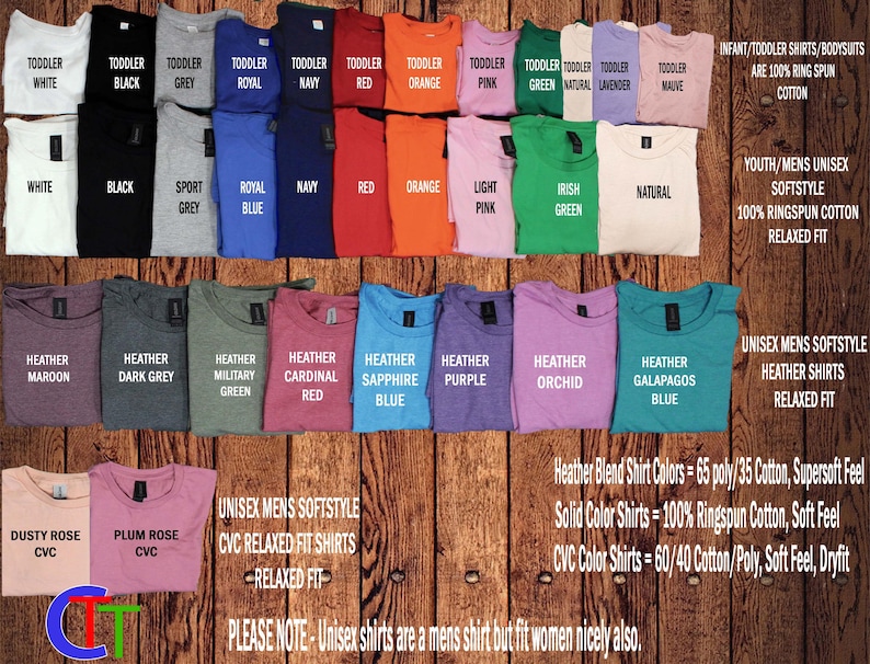 a variety of colorful t-shirts, including different colors and patterns, arranged on a wooden background.