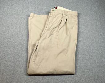 Pantalones chinos plisados vintage Tommy Hilfiger, talla 36x34 (equivalente a 34x29), color caqui, pierna ancha, estilo años 90.