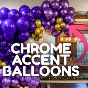 May include: A balloon arch featuring purple, gold, and white chrome accent balloons. The balloons are arranged in a cascading design, with the text "CHROME ACCENT BALLOONS" overlaid on the image. The balloons are of varying sizes.