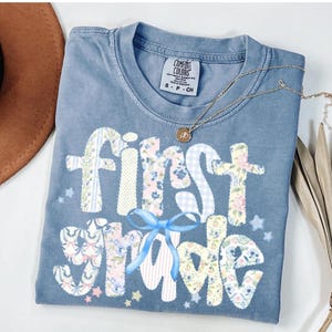 Comfort Colors® First Grade Teacher Shirt, Back to School 1st Grade Tee, Teacher Appreciation Gift, Cute Elementary School, Coquette Bow