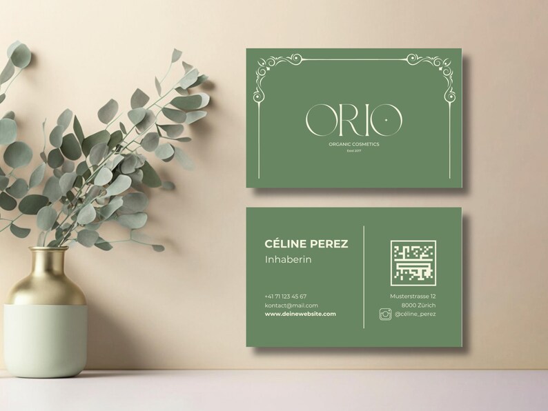 May include: Two business cards with a green background and white text. The top card has the logo "ORIO ORGANIC COSMETICS" and decorative corner elements. The bottom card includes the name "C&Eacute;LINE PEREZ", contact information, and a QR code.