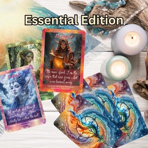 May include: An assortment of oracle cards with colorful illustrations and text, including the words "Essential Edition." The cards feature images of mystical figures and abstract designs, along with lit candles and decorative stones.