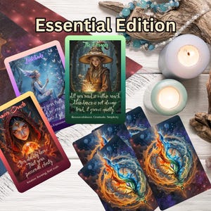 May include: An assortment of oracle cards with mystical illustrations and text, including "Essential Edition" at the top. The cards feature images of a woman, a fairy, and abstract designs. Two lit candles and decorative elements complete the scene.